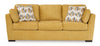 Sofá Cama Queen Keerwick completo sobre fondo blanco, tapizado mostaza con cojines decorativos estampados - Estylo House Muebleria