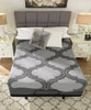 Colchón Gris Hibrido Memory Foam 12" Queen de frente, sobre base con patas, en recámara con cabecera acanalada gris, cuadro decorativo y tapete estampado - Estylo House Muebleria